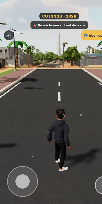 Capture du jeu : le héros marche dans une rue de Cotonou, joystick en bas de l'écran